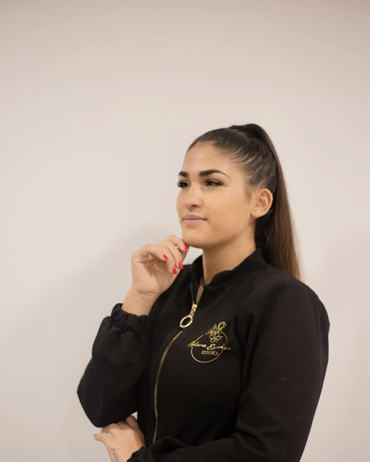Marta Pujol, founder of Adara Essence, in the centre uniform